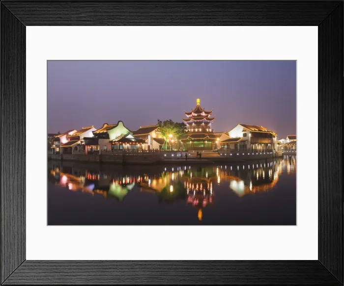 Framed Print : Traditional old riverside houses and pagoda illuminated at night in Shantang water town Framed Print : Traditional old riverside houses and pagoda illuminated at night in Shantang water town