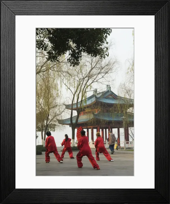 Framed Print : Women practising tai chi in front of a pavilion on West Lake, Hangzhou Framed Print : Women practising tai chi in front of a pavilion on West Lake, Hangzhou