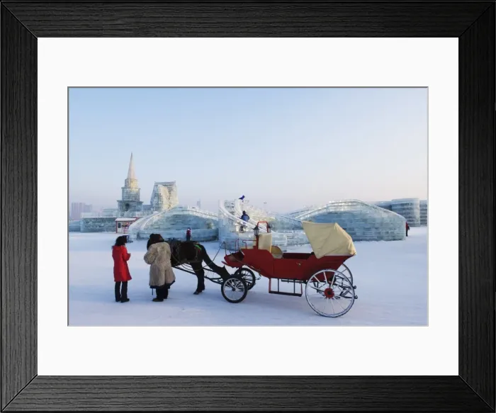 Framed Print : A horse and carriage ride and snow and ice sculptures at the Ice Lantern Festival Framed Print : A horse and carriage ride and snow and ice sculptures at the Ice Lantern Festival