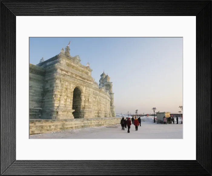 Framed Print : Tourists walking past the snow and Ice Sculptures at the Ice Lantern Festival Framed Print : Tourists walking past the snow and Ice Sculptures at the Ice Lantern Festival