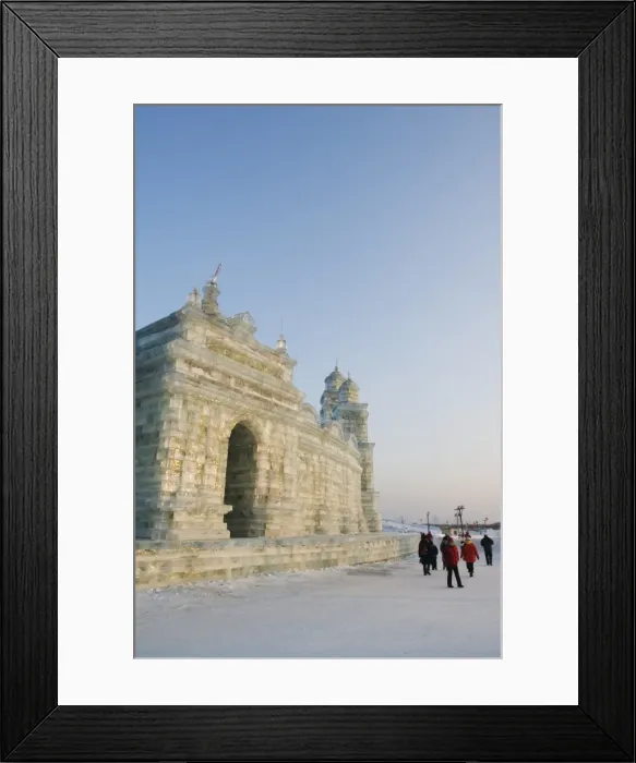 Framed Print : Tourists walking past the snow and Ice Sculptures at the Ice Lantern Festival Framed Print : Tourists walking past the snow and Ice Sculptures at the Ice Lantern Festival