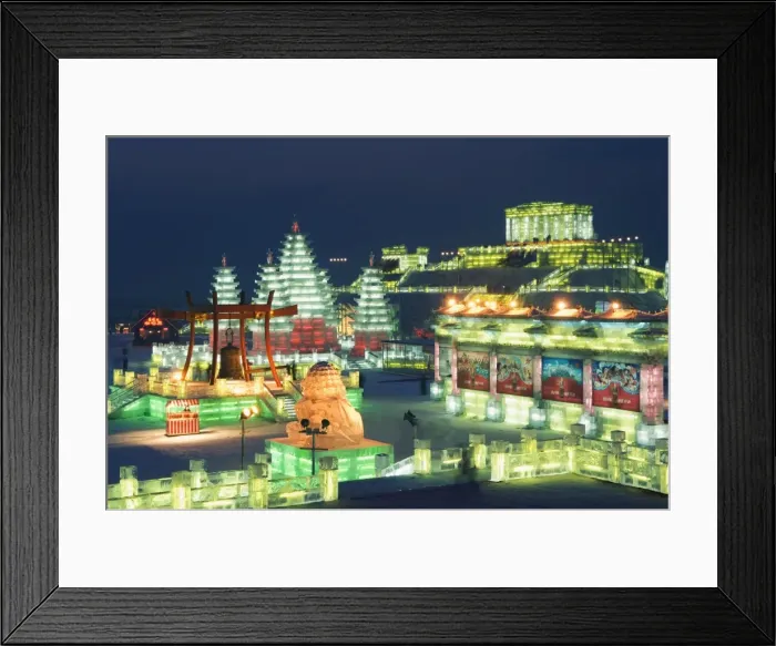 Framed Print : Snow and ice sculptures illuminated at night at the Ice Lantern Festival Framed Print : Snow and ice sculptures illuminated at night at the Ice Lantern Festival