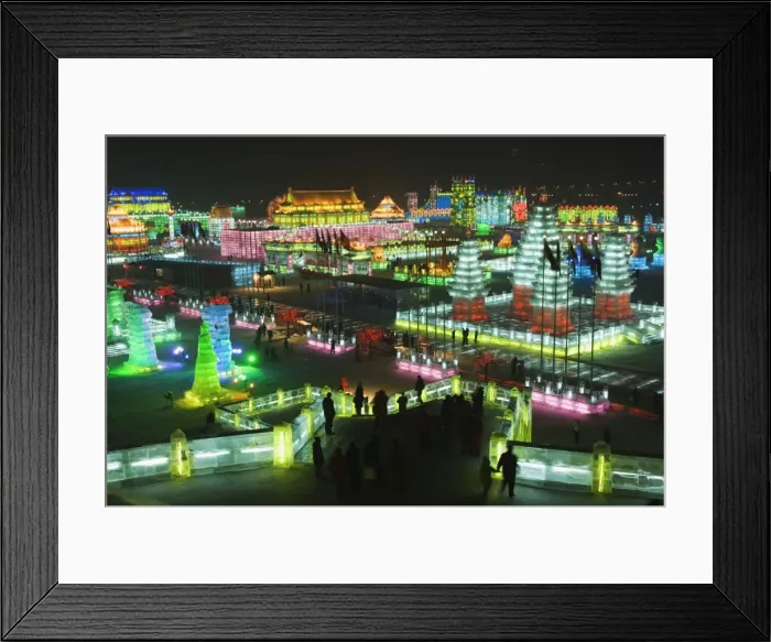 Framed Print : Snow and ice sculptures illuminated at night at the Ice Lantern Festival Framed Print : Snow and ice sculptures illuminated at night at the Ice Lantern Festival