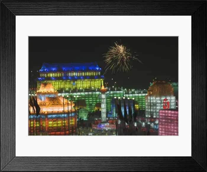 Framed Print : Fireworks over ice sculptures illuminated at night at the Ice Lantern Festival Framed Print : Fireworks over ice sculptures illuminated at night at the Ice Lantern Festival