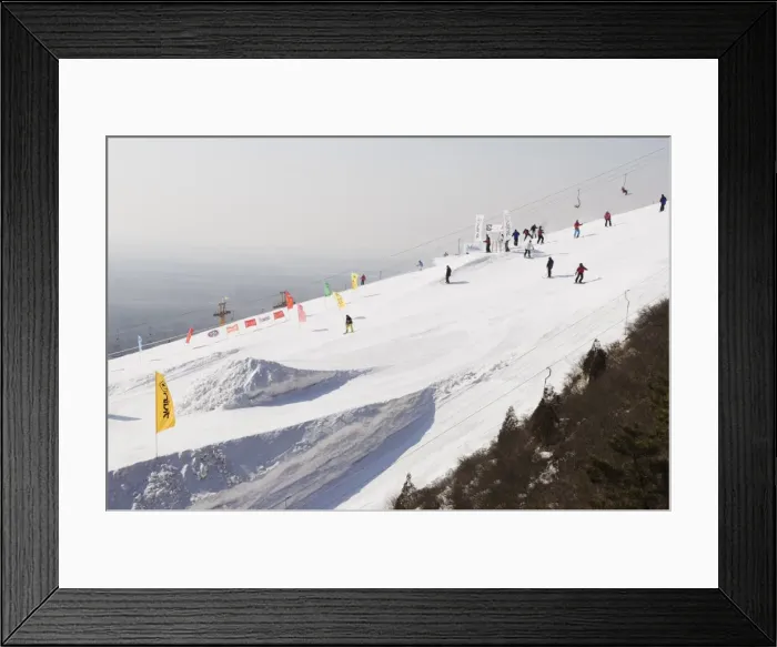 Framed Print : Skiers and snowboarders at Shijinglong ski resort, Beijing, China, Asia