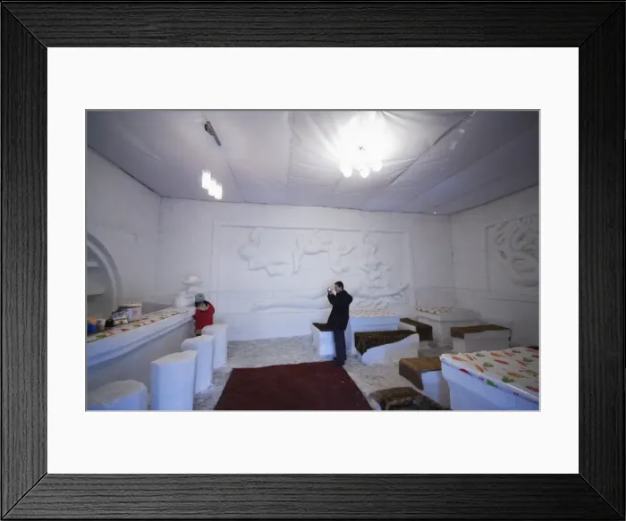 Framed Print : An ice carved coffee shop at the Snow and Ice Sculpture Festival, Sun Island Park Framed Print : An ice carved coffee shop at the Snow and Ice Sculpture Festival, Sun Island Park