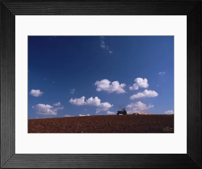 Framed Print : Tractor crossing field, Cuba, West Indies, Central America