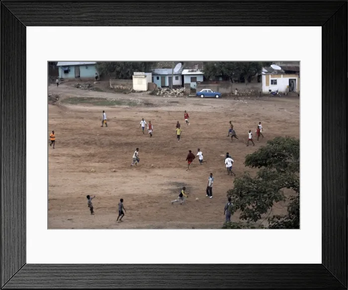 Framed Print : Children play football on a dirt pitch in Harar, Ethiopia, Africa Framed Print : Children play football on a dirt pitch in Harar, Ethiopia, Africa