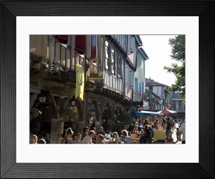 Framed Print : Cafe and half-timbered buildings, Place de la Couverts, Mirepoix, Ariege Framed Print : Cafe and half-timbered buildings, Place de la Couverts, Mirepoix, Ariege