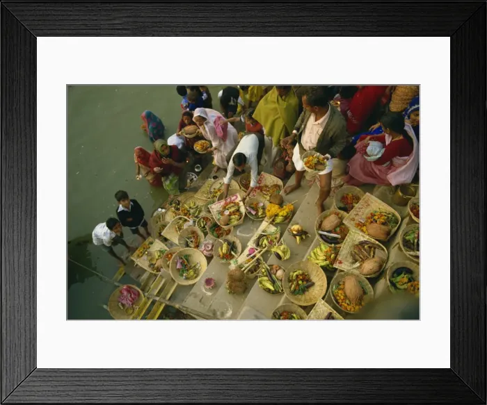 Framed Print : Offerings to the sun god Surya on the ghats during the Sun Worship Festival Framed Print : Offerings to the sun god Surya on the ghats during the Sun Worship Festival