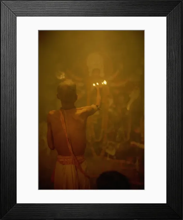 Framed Print : Temple priest before the image of the ten armed warrior goddess Durga, Durga Puja Festival Framed Print : Temple priest before the image of the ten armed warrior goddess Durga, Durga Puja Festival