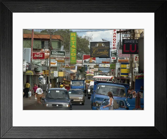 Framed Print : Cars and signs in main street, Heredia, Central Valley, Costa Rica, Central America Framed Print : Cars and signs in main street, Heredia, Central Valley, Costa Rica, Central America