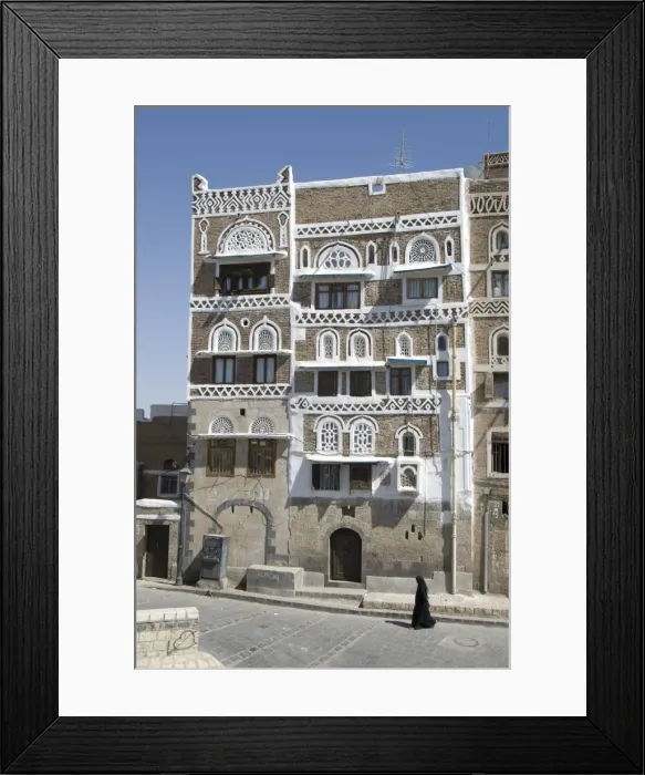 Framed Print : Traditional ornamented brick architecture on tall houses, Old City, Sana a Framed Print : Traditional ornamented brick architecture on tall houses, Old City, Sana a