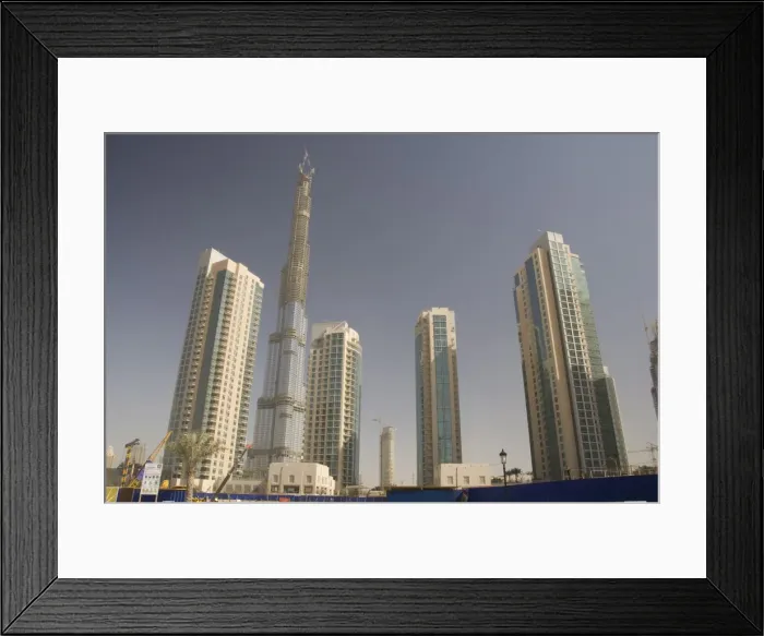 Framed Print : New high rise buildings inland from Jumeirah area, Burj Dubai, worlds tallest building under construction in background, Dubai Creek, Dubai, United Arab Emirates Framed Print : New high rise buildings inland from Jumeirah area, Burj Dubai, worlds tallest building under construction in background, Dubai Creek, Dubai, United Arab Emirates