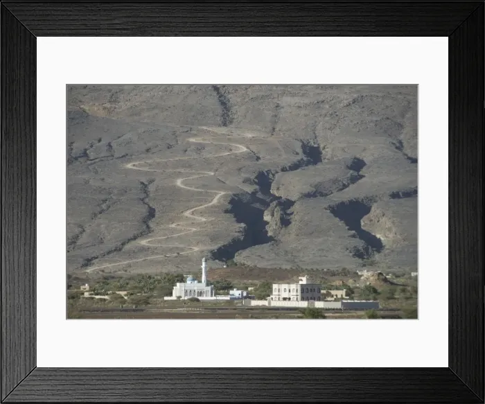 Framed Print : New village mosque, with road behind climbing onto Jabal Akhdar, Tanuf Framed Print : New village mosque, with road behind climbing onto Jabal Akhdar, Tanuf