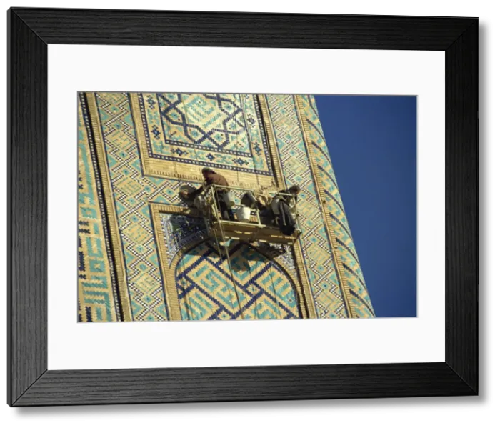 Framed Print : Workers in cradle refurbishing the 17th century Sher Dor Madressa, Registan Square Framed Print : Workers in cradle refurbishing the 17th century Sher Dor Madressa, Registan Square