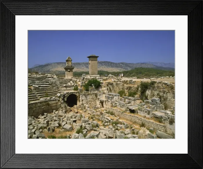 Framed Print : The theatre, with Lycean tombs in the background, Xanthos, UNESCO World Heritage Site Framed Print : The theatre, with Lycean tombs in the background, Xanthos, UNESCO World Heritage Site