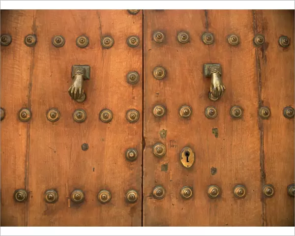 Detail of old door with hand of Fatima doorknockers, Ronda, Andalucia, Spain, Europe
