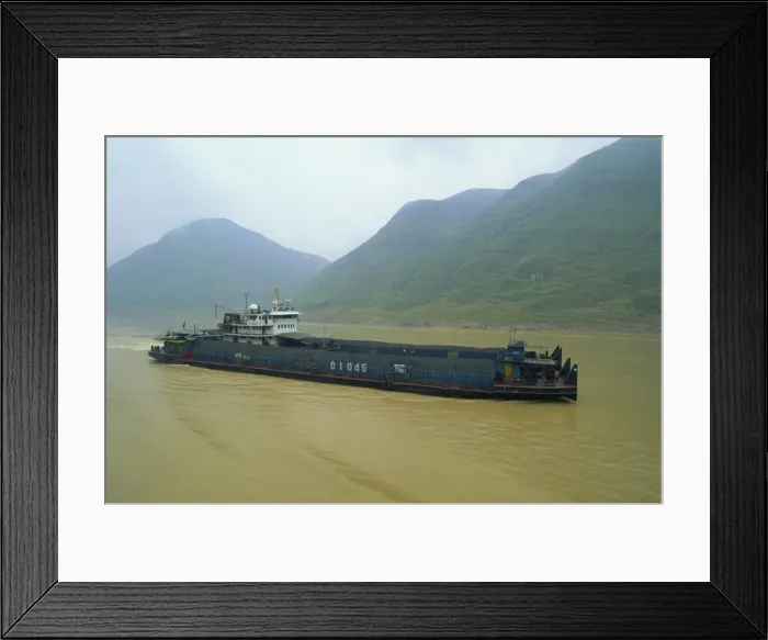 Framed Print : Coal barge on the scenic Three Gorges section of the Yangzi River between Wanxian