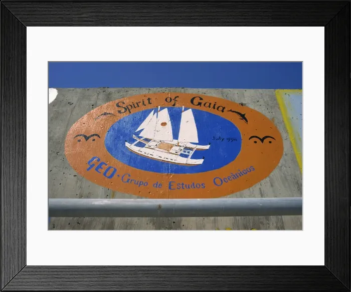Framed Print : Sea wall at port decorated with pictorial souvenirs of boats visit Framed Print : Sea wall at port decorated with pictorial souvenirs of boats visit