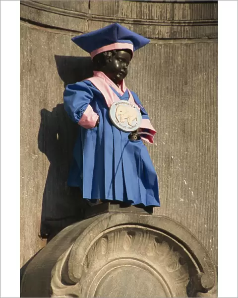 Manneken Pis statue dressed in garb of Brotherhood of Red Elephant, a brewery charity