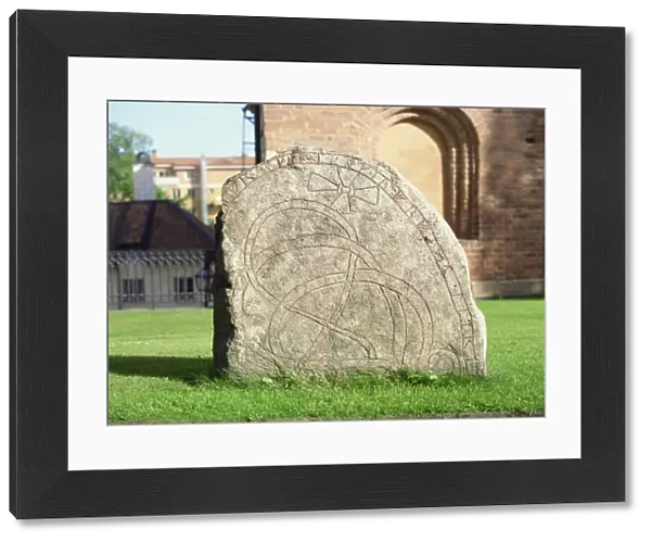 Rune stone in grounds of Uppsala cathedral, Sweden, Scandinavia, Europe