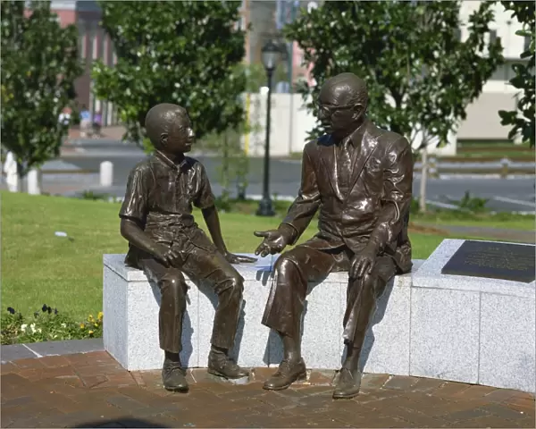 Bronze man and boy statue, Woldenberg Riverfront Park, New Orleans, Louisiana