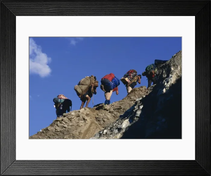 Framed Print : Trek porters on eroded trail to Ghorapani Pass near Chitre, Nepal, Asia Framed Print : Trek porters on eroded trail to Ghorapani Pass near Chitre, Nepal, Asia