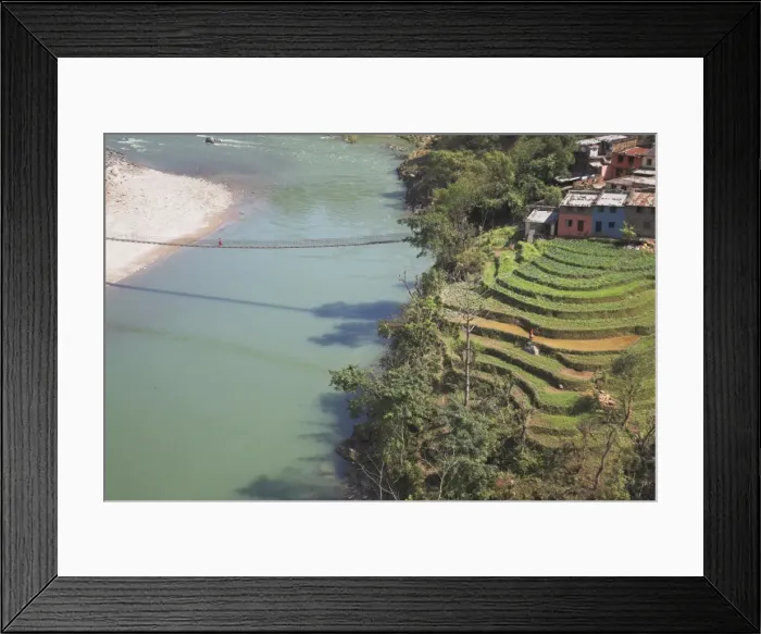 Framed Print : Suspension bridge and terraced fields in front of the Trisuli Center, whitewater base for Himalayan Encounters, Bandare village, Trisuli Valley Framed Print : Suspension bridge and terraced fields in front of the Trisuli Center, whitewater base for Himalayan Encounters, Bandare village, Trisuli Valley