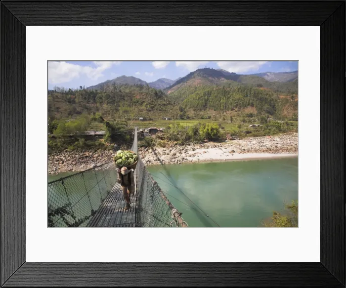 Framed Print : Man carrying vegetables across a rope bridge, Trisuli Center, Bandare Village Framed Print : Man carrying vegetables across a rope bridge, Trisuli Center, Bandare Village