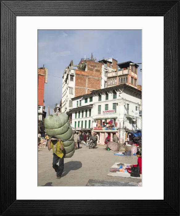 Framed Print : Man carrying heavy load through the street, Hanuman Dhoka, Durbar Square Framed Print : Man carrying heavy load through the street, Hanuman Dhoka, Durbar Square
