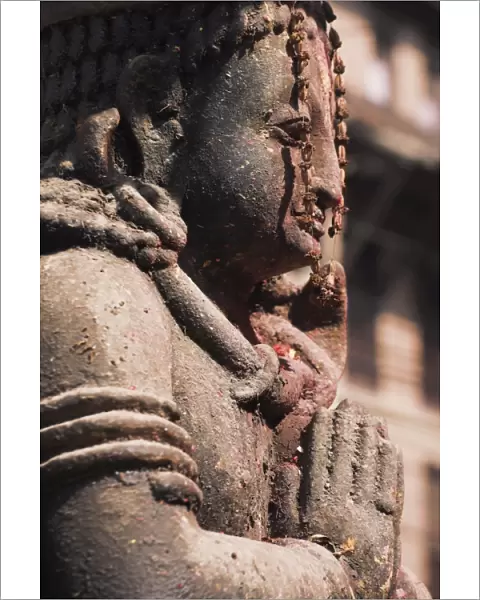 Temple statue adorned with red pigment, Patan, Bagmati, Nepal, Asia