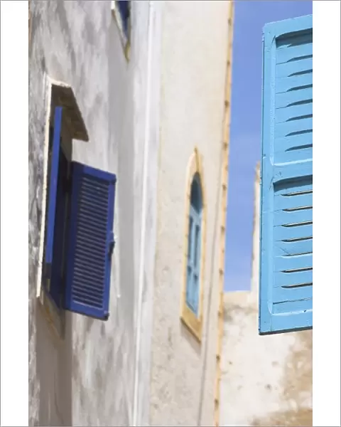 Blue shuttered windows on houses in Medina, Essaouira, Morocco, North Africa, Africa