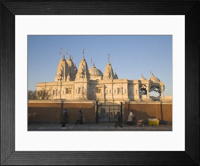 Framed Print : People walking past Shri Swaminarayan Mandir Temple, the largest Hindu temple outside India Framed Print : People walking past Shri Swaminarayan Mandir Temple, the largest Hindu temple outside India