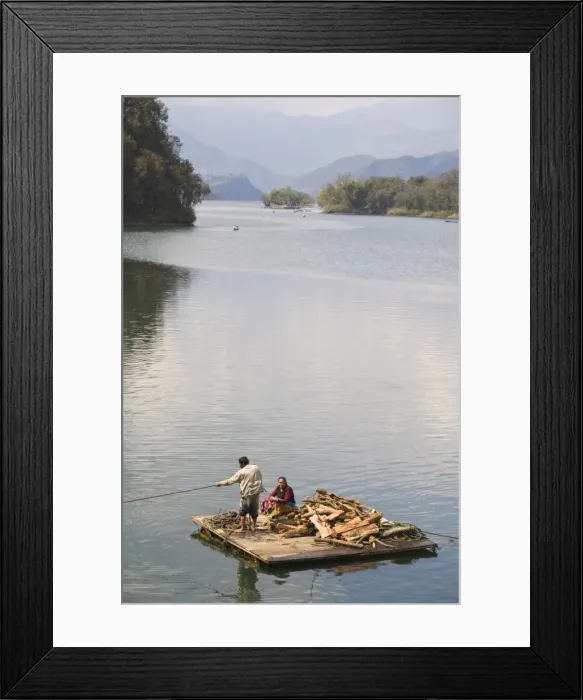 Framed Print : Couple on wooden raft with firewood, Fewa (Phewa) Lake, Pokhara, Nepal, Asia Framed Print : Couple on wooden raft with firewood, Fewa (Phewa) Lake, Pokhara, Nepal, Asia