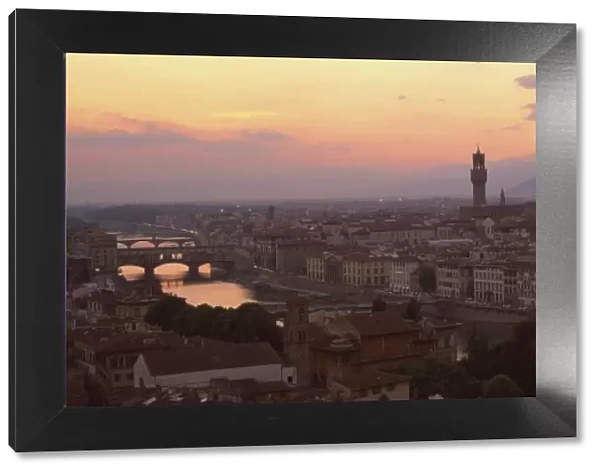 View at dusk over rooftops of Florence, showing Duomo, Uffizi and Ponte Vecchio from Pizalle Michelangelo, Florence, Tuscany