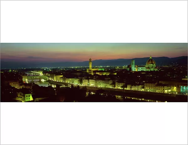 View at night over rooftops of Florence, showing Duomo, Uffizi and Ponte Vecchio from Pizalle Michelangelo, Florence, Tuscany