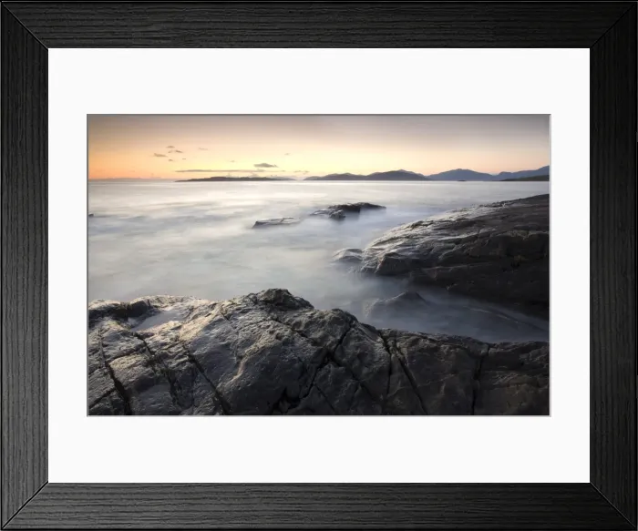 Framed Print : Dusk view across open water towards Taransay and North Harris from the rocky shore at Borve Framed Print : Dusk view across open water towards Taransay and North Harris from the rocky shore at Borve