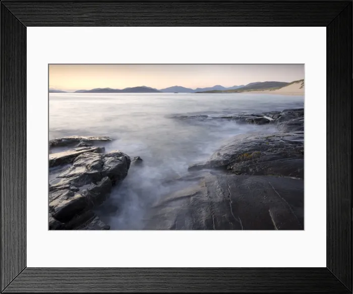 Framed Print : Dusk view across open water towards Taransay and North Harris from the rocky shore at Borve Framed Print : Dusk view across open water towards Taransay and North Harris from the rocky shore at Borve