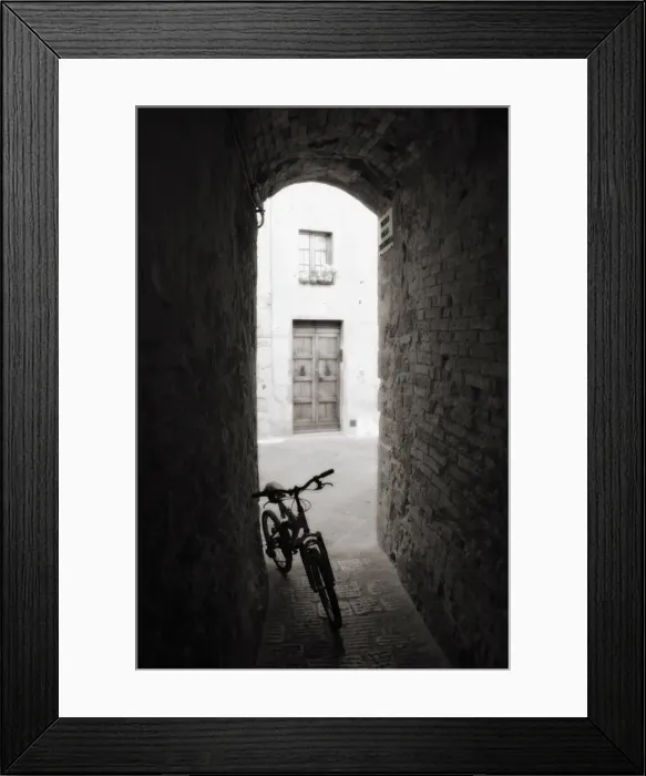 Framed Print : Infra red image of a bicycle in shady alleyway, San Quirico d Orcia Framed Print : Infra red image of a bicycle in shady alleyway, San Quirico d Orcia