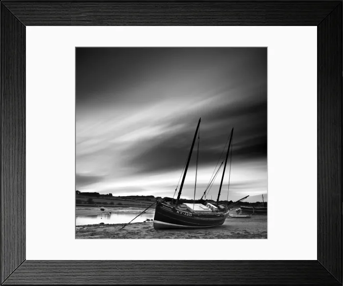 Framed Print : Long exposure used to record moving clouds above old wooden ketch on Aln Estuary at low tide Framed Print : Long exposure used to record moving clouds above old wooden ketch on Aln Estuary at low tide