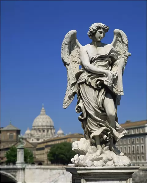 Statue of an angel in front of the dome of St. Peters in Rome, Lazio, Italy, Europe