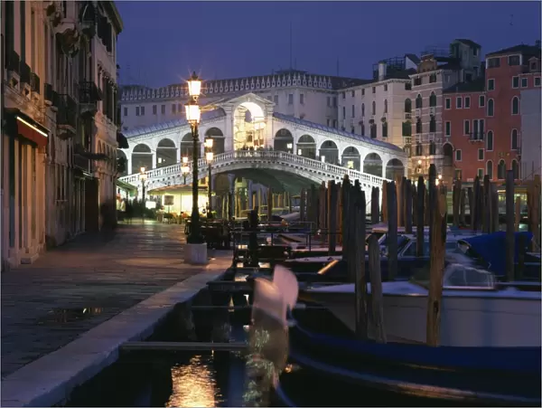 The Rialto Bridge illuminated at night in Venice, UNESCO World Heritage Site
