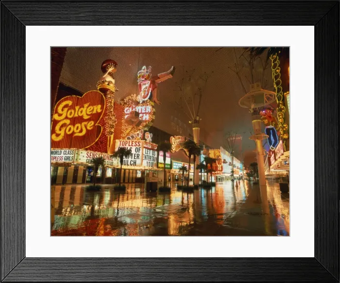 Framed Print : Night reflections on wet street of neon signs along Fremont Street in Las Vegas Framed Print : Night reflections on wet street of neon signs along Fremont Street in Las Vegas