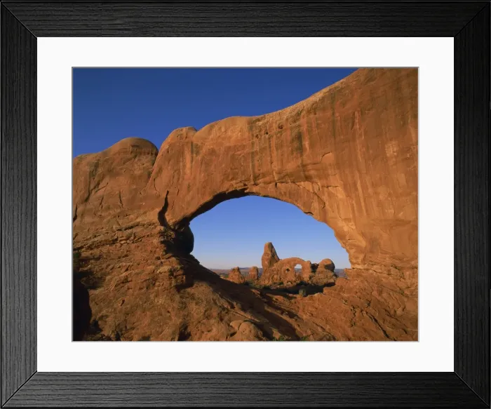 Framed Print : Rock formations caused by erosion and known as North Window Arch, Arches National Park Framed Print : Rock formations caused by erosion and known as North Window Arch, Arches National Park