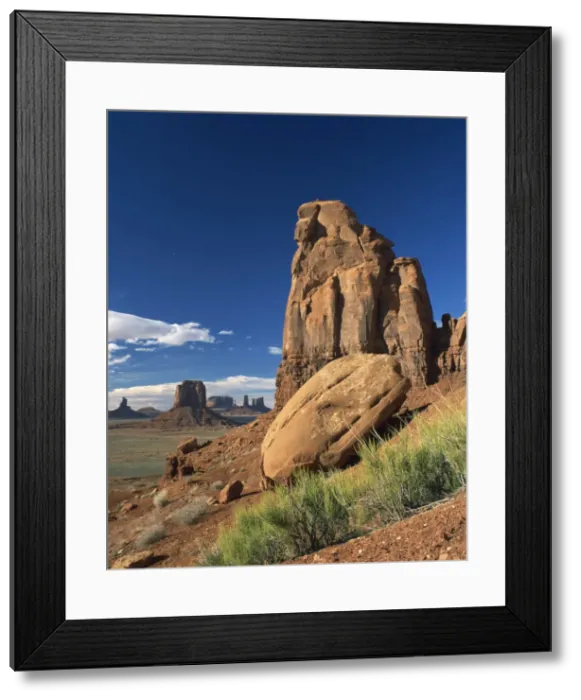Framed Print : Rock formations caused by erosion in a desert landscape in Monument Valley Framed Print : Rock formations caused by erosion in a desert landscape in Monument Valley