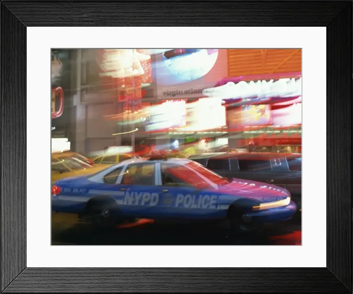 Framed Print : NYPD police car speeding through Times Square, New York City, New York Framed Print : NYPD police car speeding through Times Square, New York City, New York