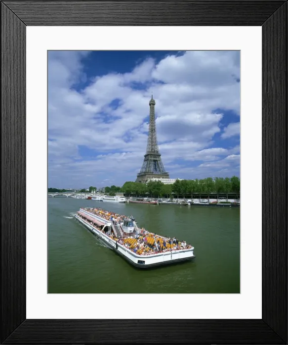 Framed Print : Tourists on bateau mouche on the River Seine with the Eiffel tower in the background Framed Print : Tourists on bateau mouche on the River Seine with the Eiffel tower in the background