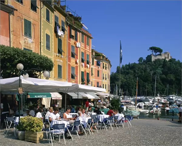 A pavement cafe on the waterfront at Portofino, in Liguria, Italy, Europe