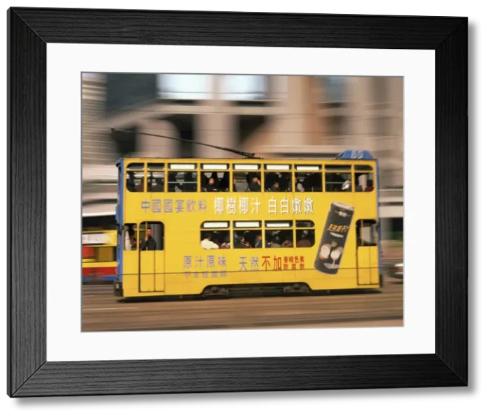 Framed Print : Tram in motion, Causeway Bay, Hong Kong, China, Asia Framed Print : Tram in motion, Causeway Bay, Hong Kong, China, Asia